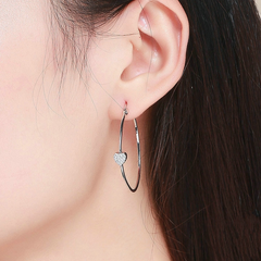 Boucles d'Oreilles Créoles Coeurs - Image 2