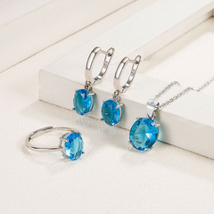 Parure de Bijoux Argent Sterling 925 plaqué or blanc avec collier, boucles d’oreilles et bague ajustable avec zircons bleus - Photo 2