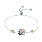Bracelet Reine des Abeilles en argent 925 plaqué or blanc ajustable avec zircons couleur champagne