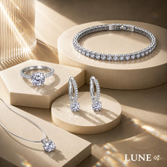 Coffret "Éclat Éternel" : Parure Diamants de Synthèse avec Bague Solitaire, Bracelet Tennis et Collier Point Lumineux.
