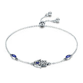 Bracelet Hamsa en argent 925 plaqué or blanc ajustable avec zircons blancs et bleus