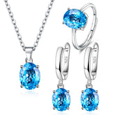 Parure de Bijoux Argent Sterling 925 plaqué or blanc avec collier, boucles d’oreilles et bague ajustable avec zircons bleus