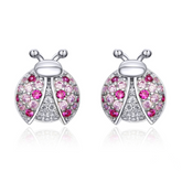 Boucles coccinelles roses