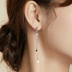 Boucle d'oreille étoiles argentée