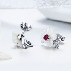 Boucles fleurs rouges blanches