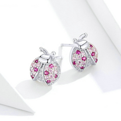 Boucles coccinelles roses