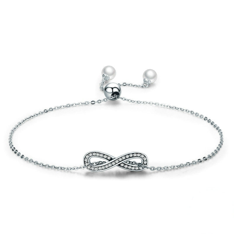 Bracelet Infini en argent 925 plaqué or blanc ajustable avec zircons blancs et perles