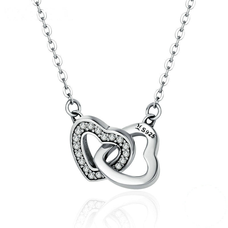 Collier Deux Coeurs en argent 925 plaqué or blanc ajustable avec zircons blancs