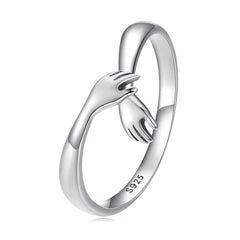 Bague Câlin en argent 925 plaqué or blanc ajustable avec étreinte et détail des mains