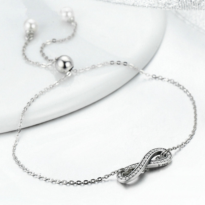 Bracelet Infini en argent 925 plaqué or blanc ajustable avec zircons blancs et perles - Photo 5