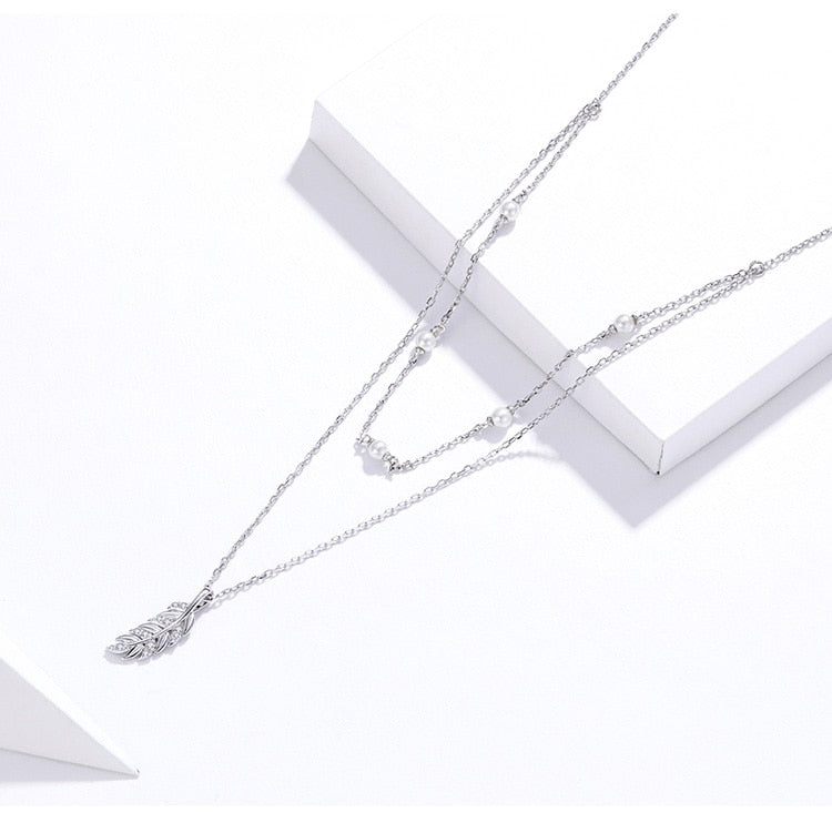Collier Double avec Plume en argent 925 plaqué or blanc ajustable avec zircons blancs et perles - Photo 6