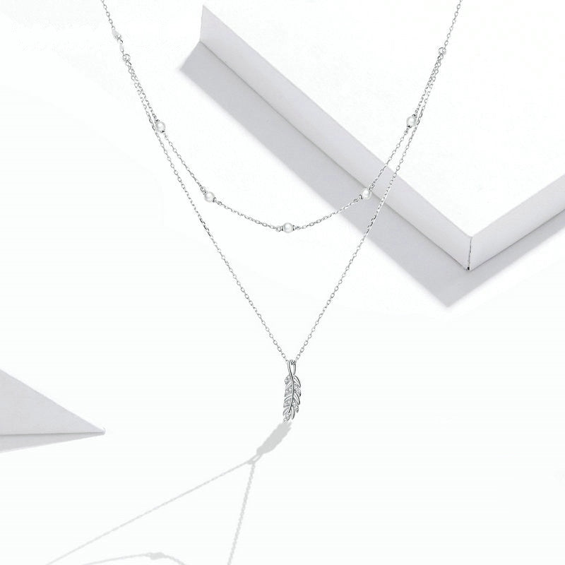 Collier Double avec Plume en argent 925 plaqué or blanc ajustable avec zircons blancs et perles - Photo 3