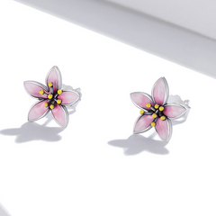 Clous d'oreilles fleurs roses