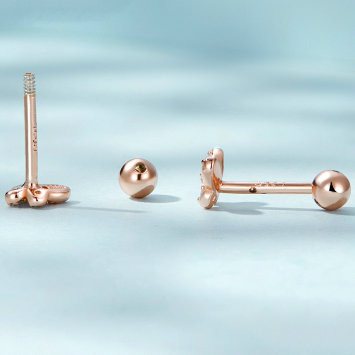 Clous d'oreilles papillons roses