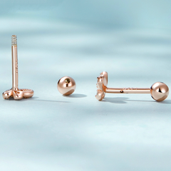 Clous d'oreilles papillons roses