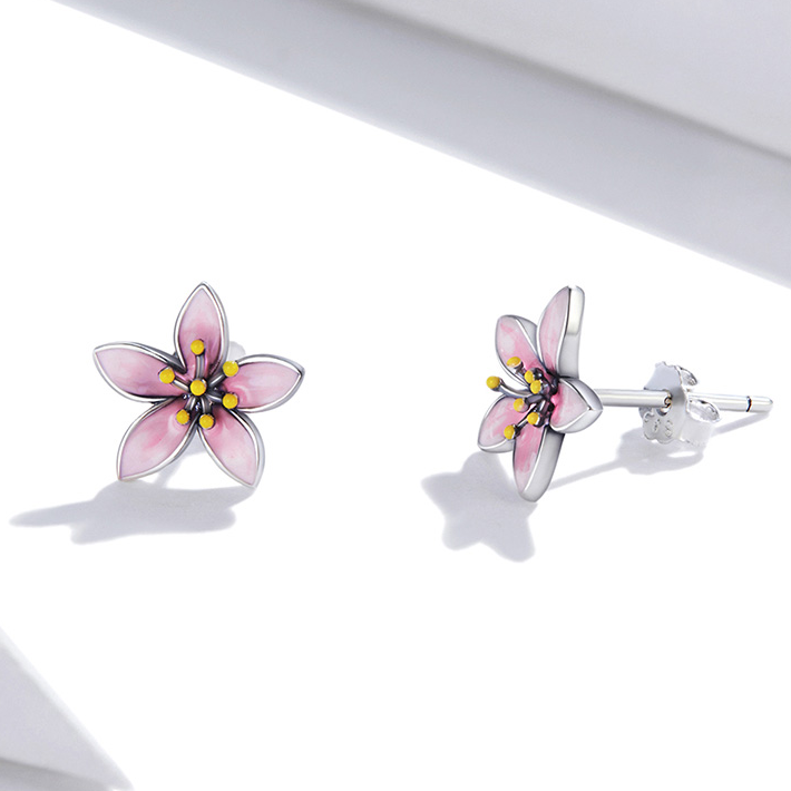 Clous d'oreilles fleurs roses