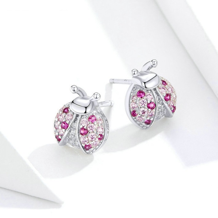 Boucles coccinelles roses