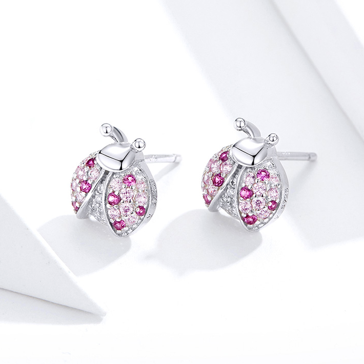 Boucles coccinelles roses