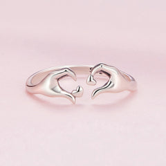Bague mains cœur argent